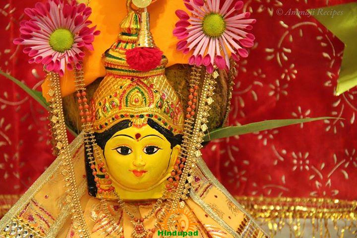 Mangla-gauri puja with priest cutting child's hair in sacred tradition