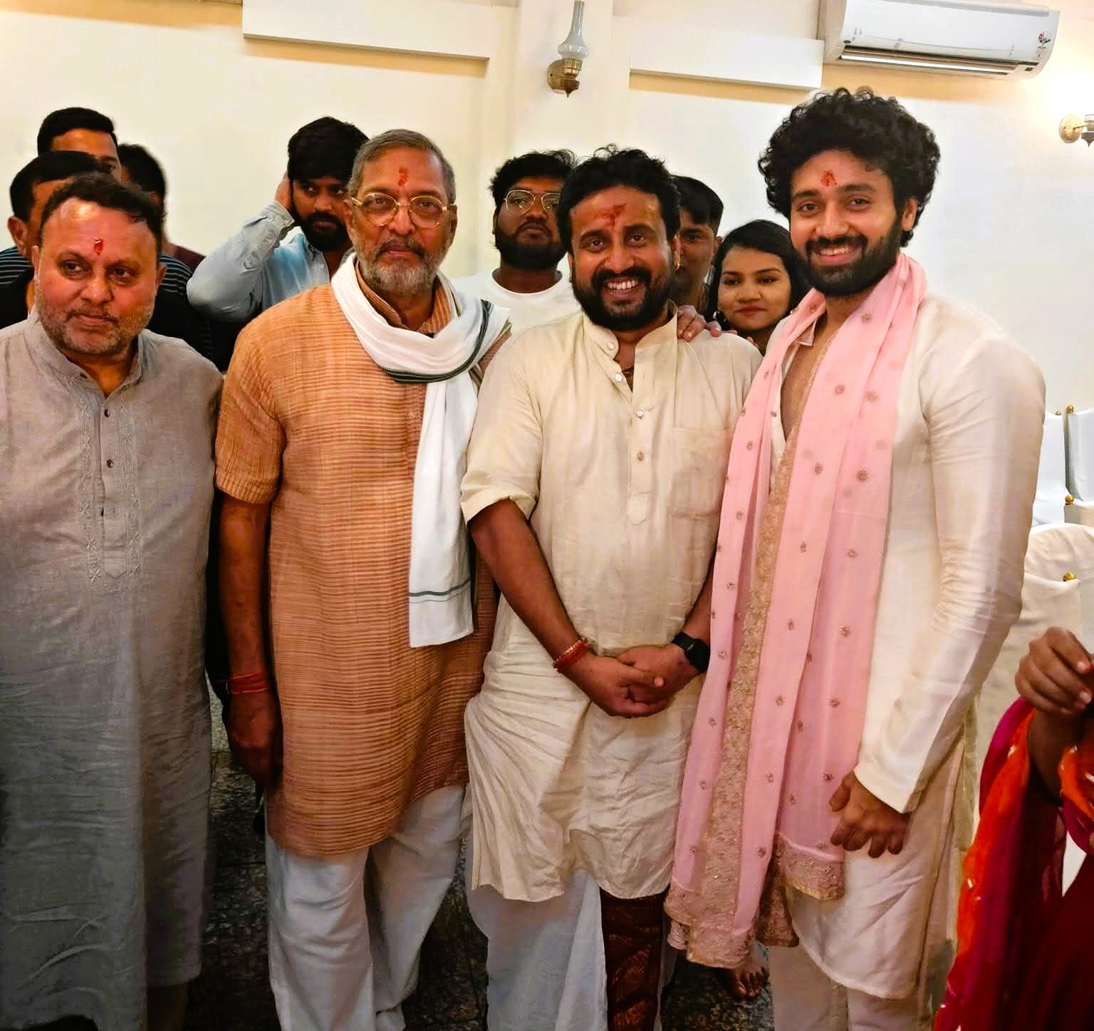 Colorful rangoli decorations for a special puja ceremony