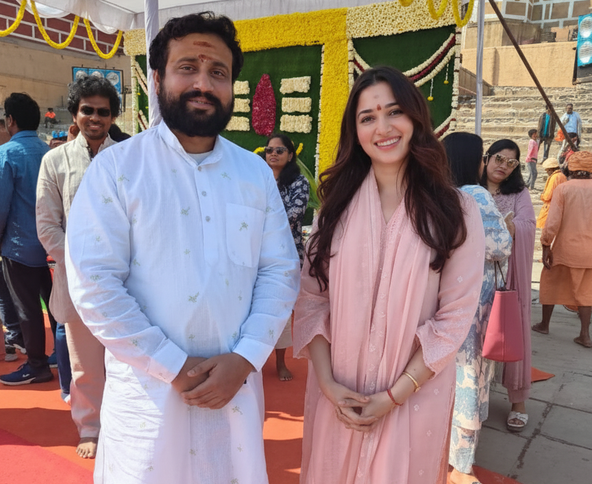 Close-up of puja thali with flowers, fruits and diya arranged beautifully